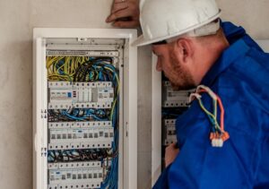 Electrician looking at a panel